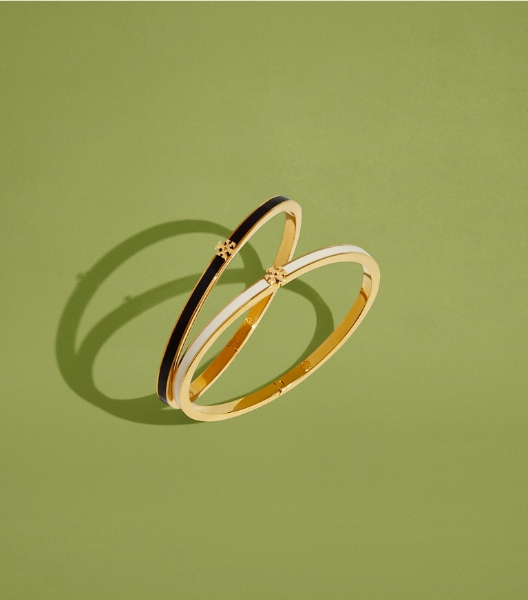 Tory Burch designer bracciali Braccialetto Icon smaltato a trama sottile in Tory Gold / New Ivory editorial