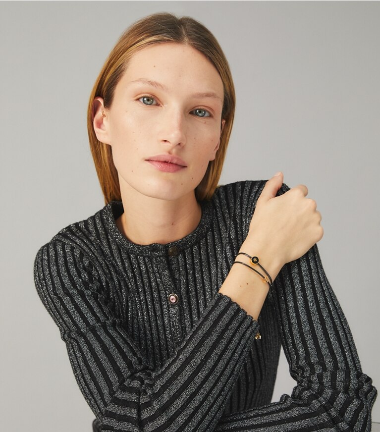 Tory Burch designer bracciali Braccialetto Kira smaltato con cursore in Tory Gold / Green Citrine accessory on model