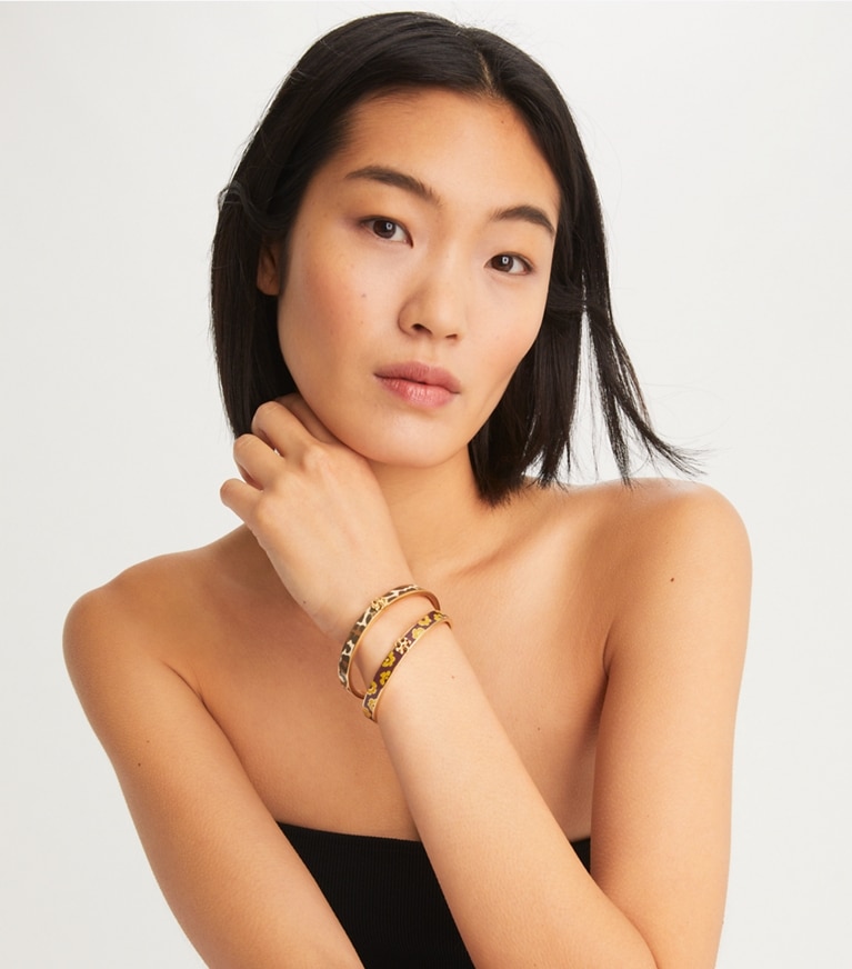 Tory Burch designer bracciali Braccialetto Kira smaltato da 7 mm in Tory Gold / Leopard Bronze front