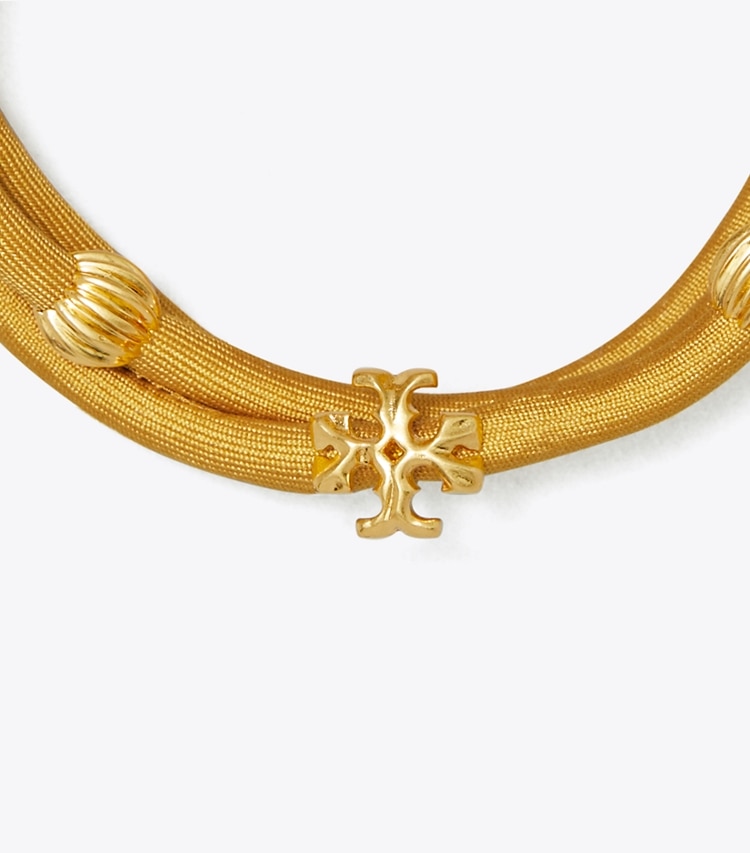 Tory Burch designer bracelets Bracelet à enrouler en soie Roxanne dans Rolled Gold / Honey Gold détails
