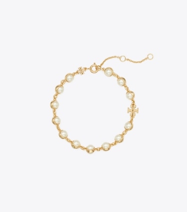 Tory Burch designer bracelets Bracelet à perles Moondance in Light Brass / Ivory front