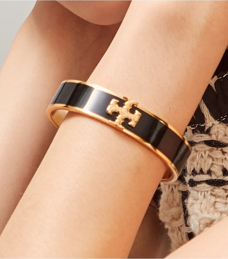 Tory Burch designer bracelets Bracelet émaillé Kira dans Tory Gold/New Ivory accessoire sur le modèle