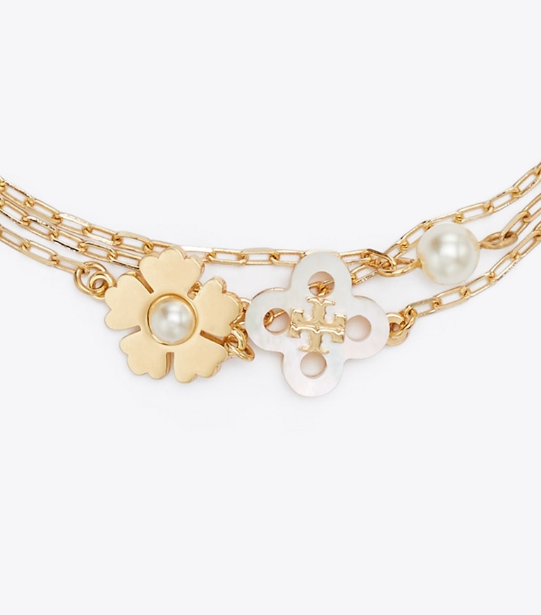 Tory Burch designer bracelets Bracelet chaîne Forget Me Not orné de perles in Tory Gold / Mother of Pearl / Cream informations