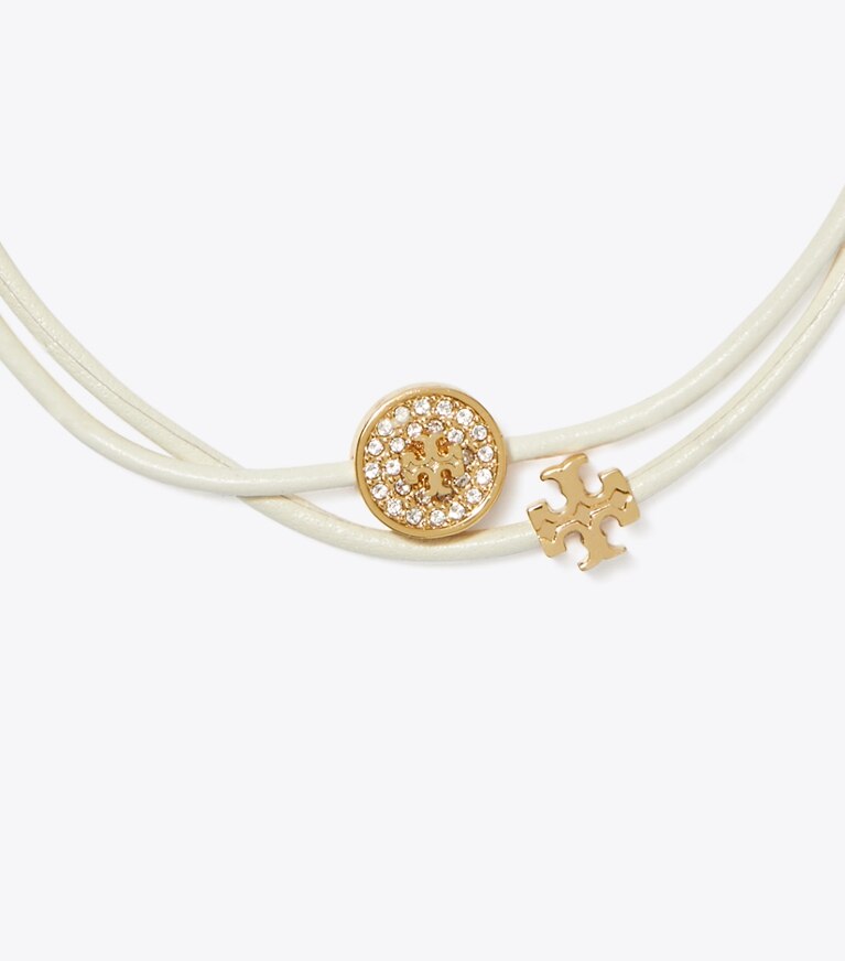 Tory Burch designer bracelets Bracelet coulissant Kira Pavé dans Tory Gold / New Ivory / Crystal détails
