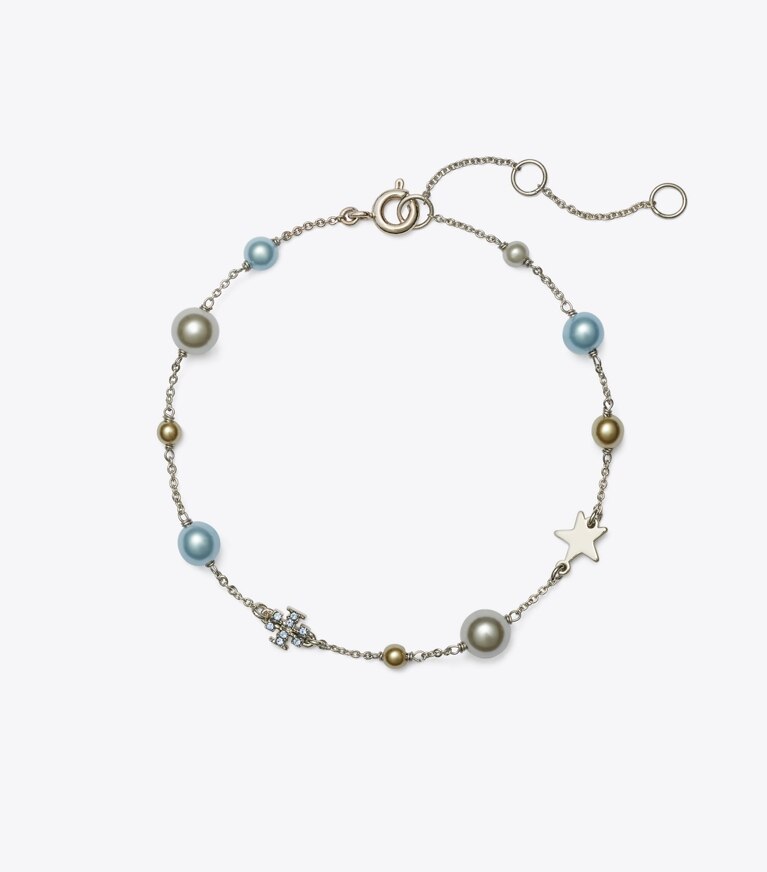 Tory Burch designer bracelets Bracelet délicat Moondance avec perle et étoile in Tory Silver / Light Sapphire / Pearl front