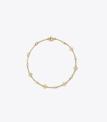 Tory Burch designer bracelets Bracelet délicat Moondance chaîne et perles in Tory Gold / Pearl front