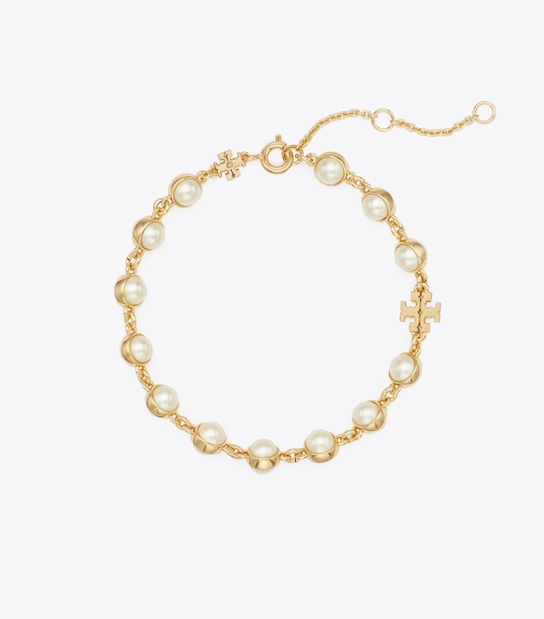 Tory Burch designer bracelets Bracelet de perles Moondance dans Light Brass / Ivory de face