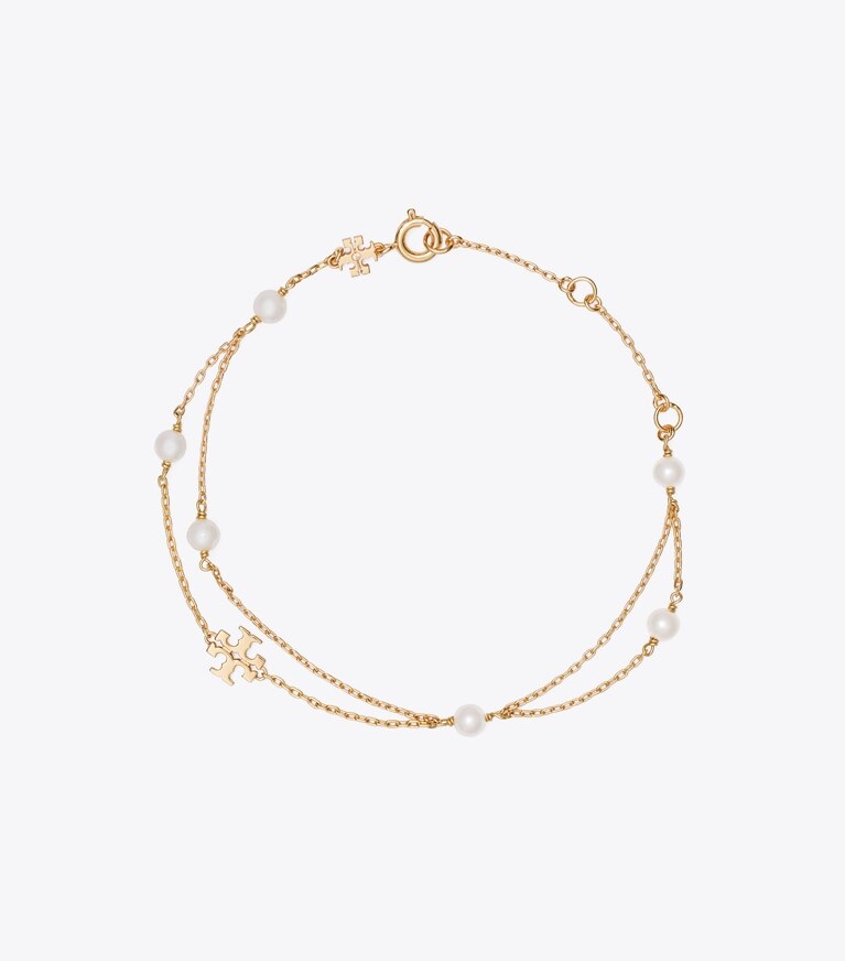 Tory Burch designer bracelets Bracelet de perles superposées Moondance dans Tory Gold / Cream de face