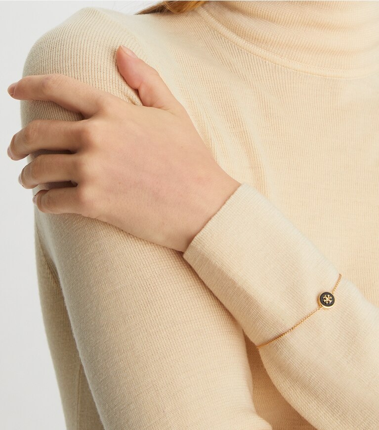 Tory Burch designer bracelets Bracelet Kira chaîne et émail in Tory Gold / New Ivory front