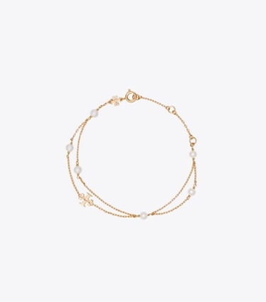 Tory Burch diseñador pulseras Brazalete de perlas en capas Moondance en Tory Gold / Cream frente