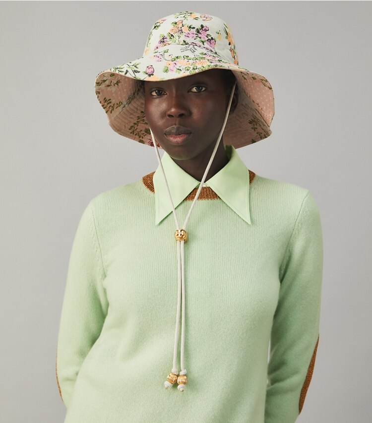 Tory Burch designer hats Brocade Reversible Bucket Hat in BAROQUE RUST JACQUARD accessory on model