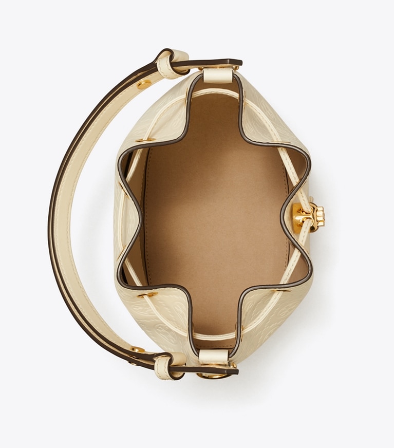 Tory Burch designer crossbody bags Bucket Bag mit geprägtem T-Monogramm in Light Cream angle