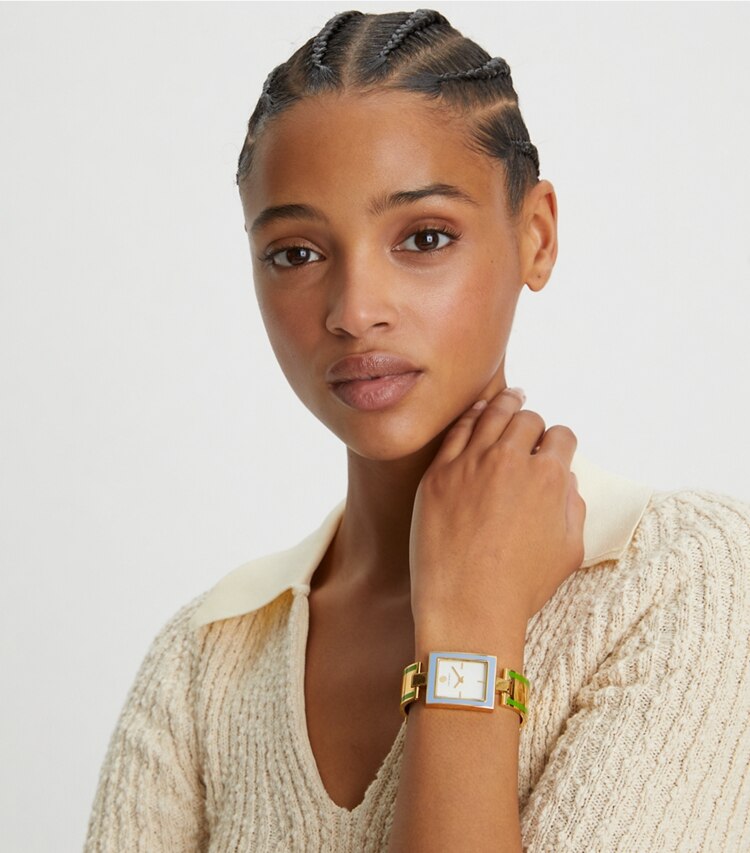 Tory Burch designer strap watches Buddy Bangle Watch, Gold-Tone/Multi-Color Stainless Steel, 26 x 32 MM in GOLD/GREEN/BLUE accessory on model