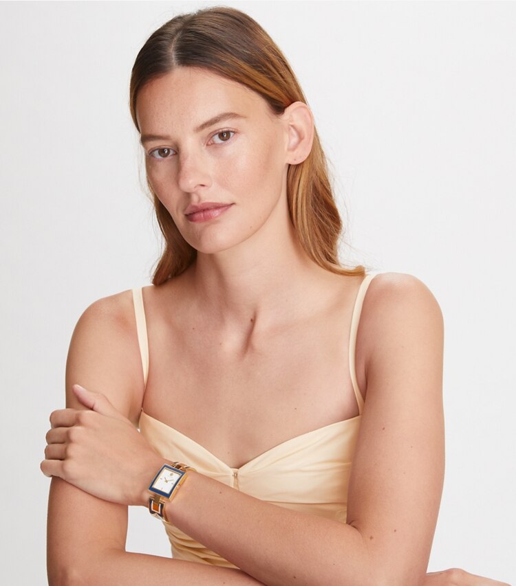 Tory Burch designer strap watches Buddy Bangle Watch, Navy/Gold-Tone Stainless Steel, 25 x 32MM  in IVORY MULTI accessory on model