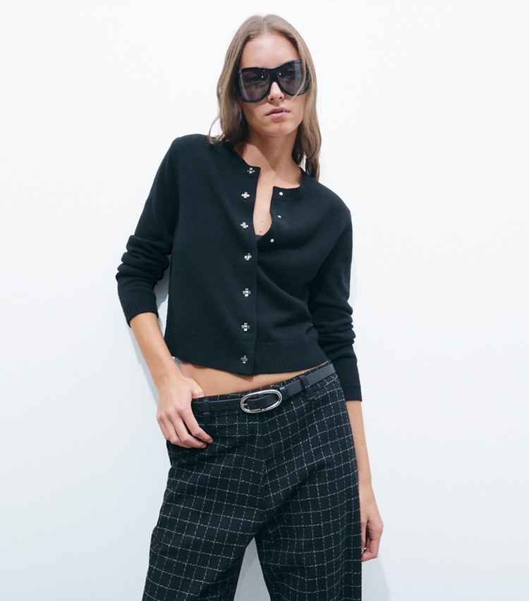 Tory Burch designer sweaters Bunny Knot Cashmere Cardigan in BLACK on model detail
