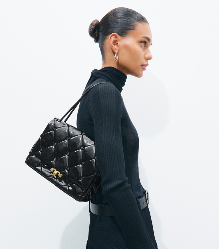 Tory Burch designer shoulder bags Bunny Knot Runway Patent Leather Shoulder Bag in Black accessory on model