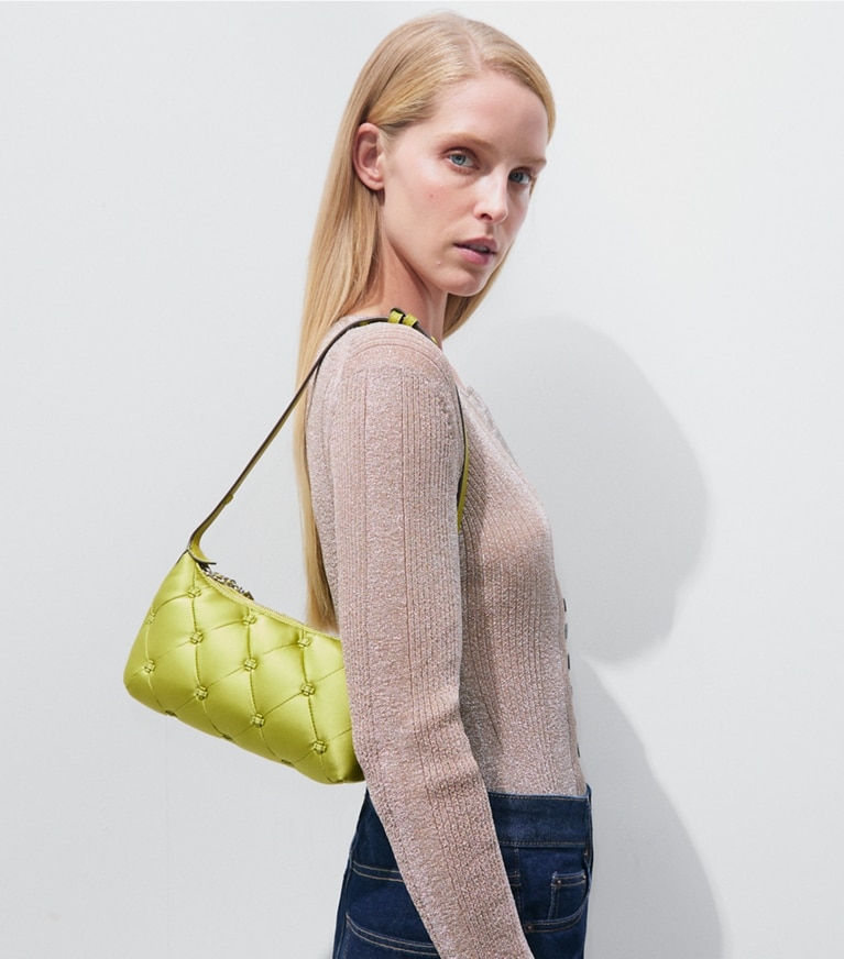 Tory Burch designer crossbody bags Bunny Knot Satin Pochette in Vibrant Green additional on model