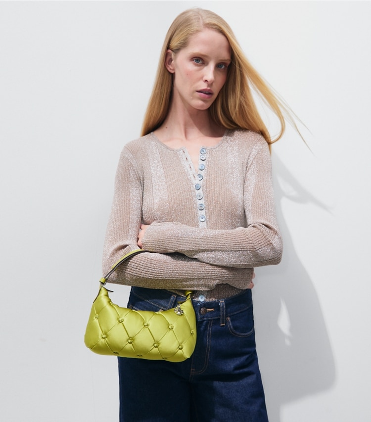 Tory Burch designer crossbody bags Bunny Knot Satin Pochette in Vibrant Green additional on model