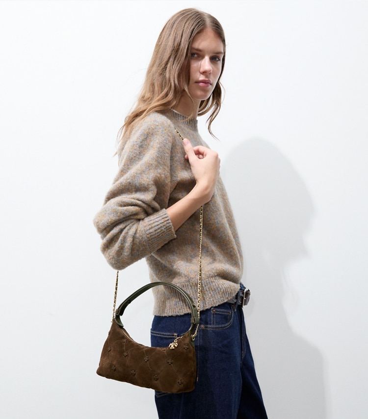 Tory Burch designer crossbody bags Bunny Knot Suede Pochette in Dark Cocoa accessory on model