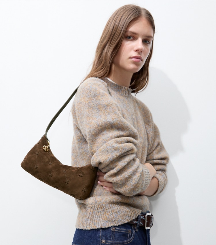 Tory Burch designer crossbody bags Bunny Knot Suede Pochette in Dark Cocoa additional on model
