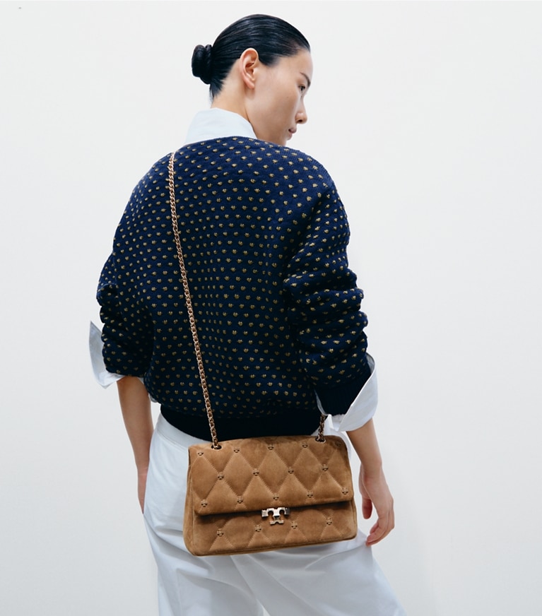 Tory Burch designer shoulder bags Bunny Knot Suede Shoulder Bag in Toffee accessory on model
