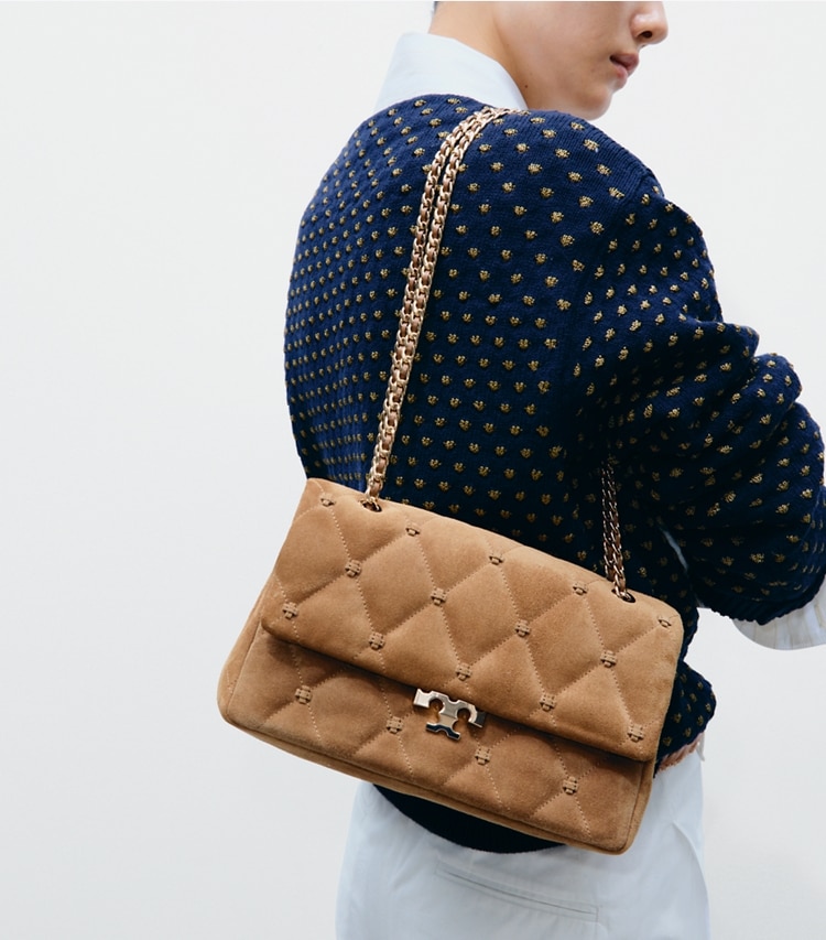 Tory Burch designer shoulder bags Bunny Knot Suede Shoulder Bag in Toffee additional on model
