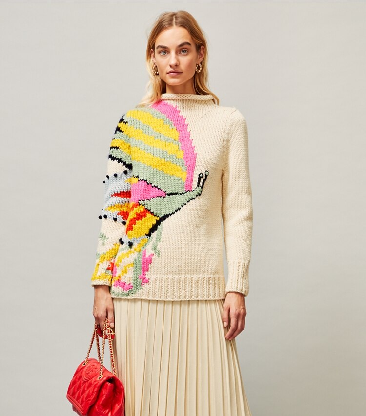 Tory Burch designer sweaters Butterfly Handknit Turtleneck in New Ivory on model detail