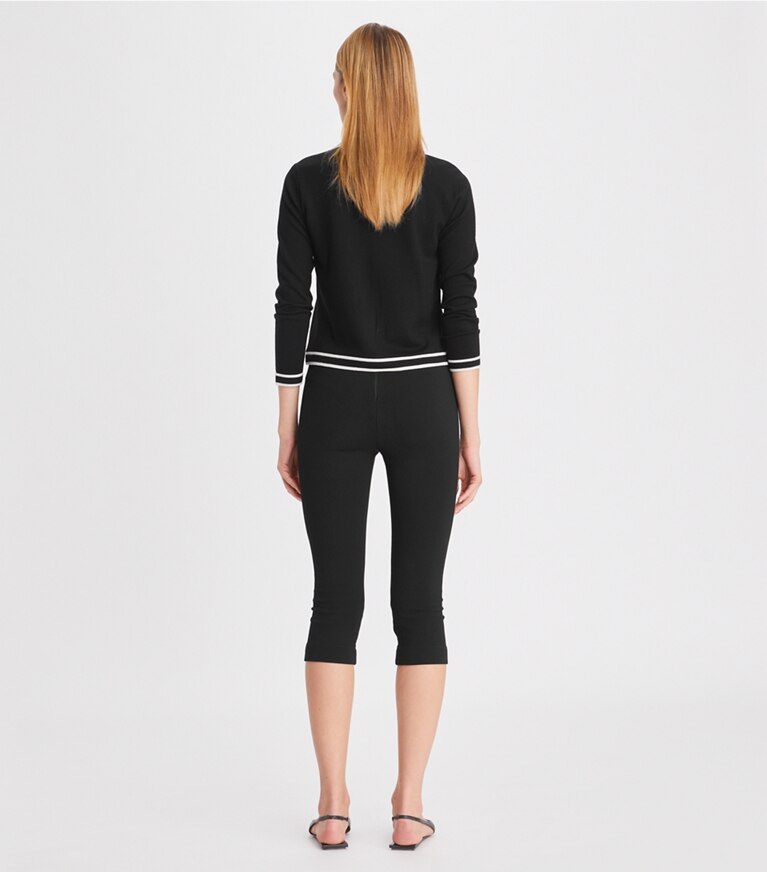 Tory Burch diseñador suéteres Cárdigan Kendra en Black / French Cream parte posterior en modelo