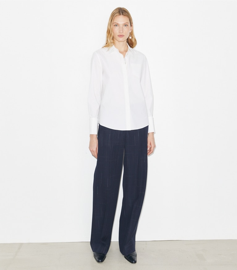 Tory Burch diseñador tops Camisa de algodón en White frente en modelo