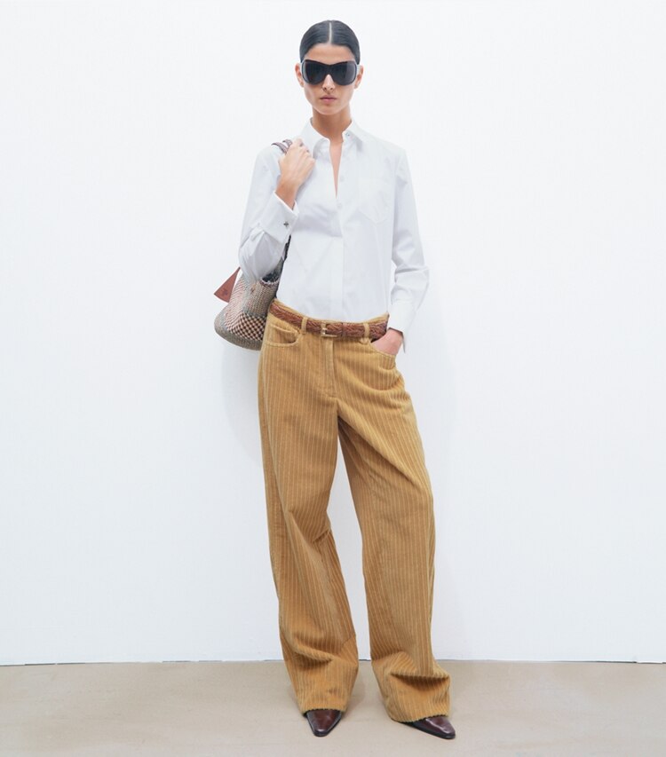 Tory Burch diseñador tops Camisa de popelina Bunny Knot en White frente en modelo