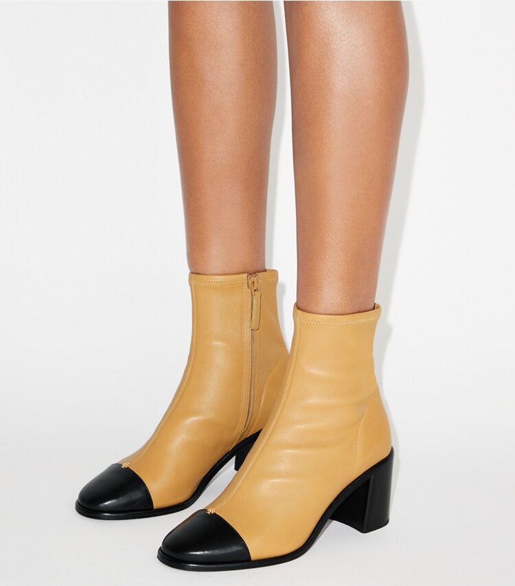 Tory Burch designer ankle boots Cap-Toe Heeled Ankle Boot in GINGER SHORTBREAD / PERFECT BLACK accessory on model