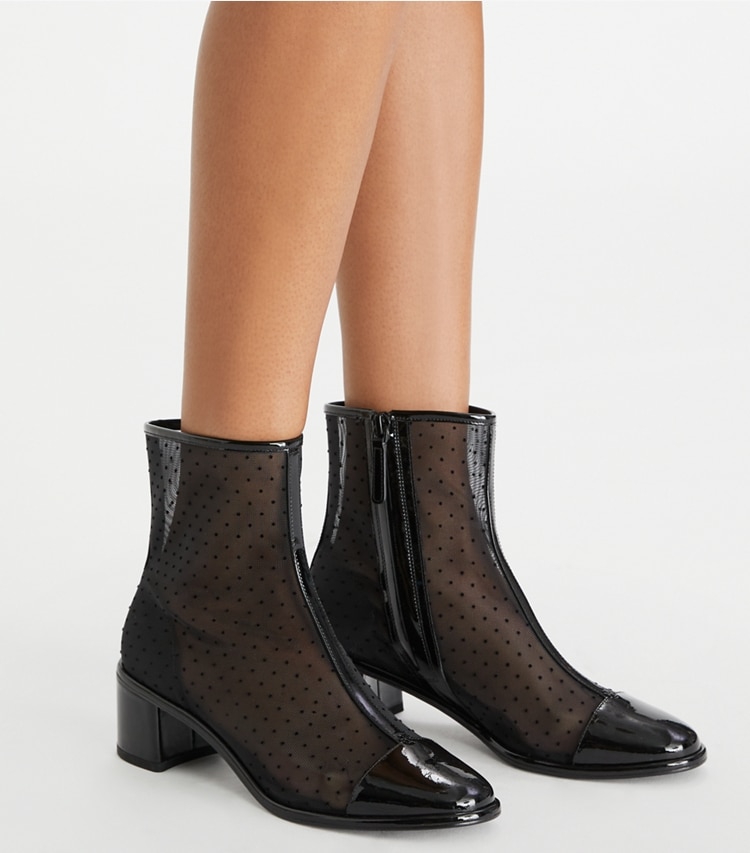 Tory Burch designer ankle boots Cap-Toe Low Heeled Ankle Boot in NERO / PERFECT BLACK accessory on model