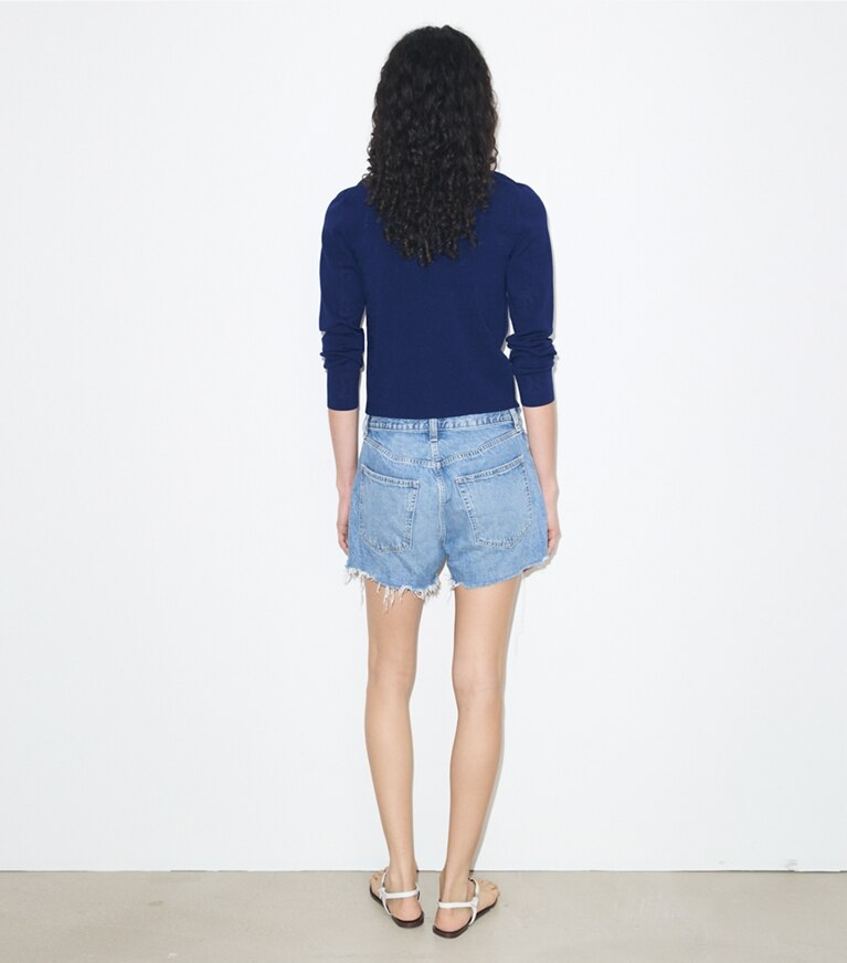 Tory Burch designer sweaters Cardigan en viscose à point pointelle dans Ocean sur modèle, de dos