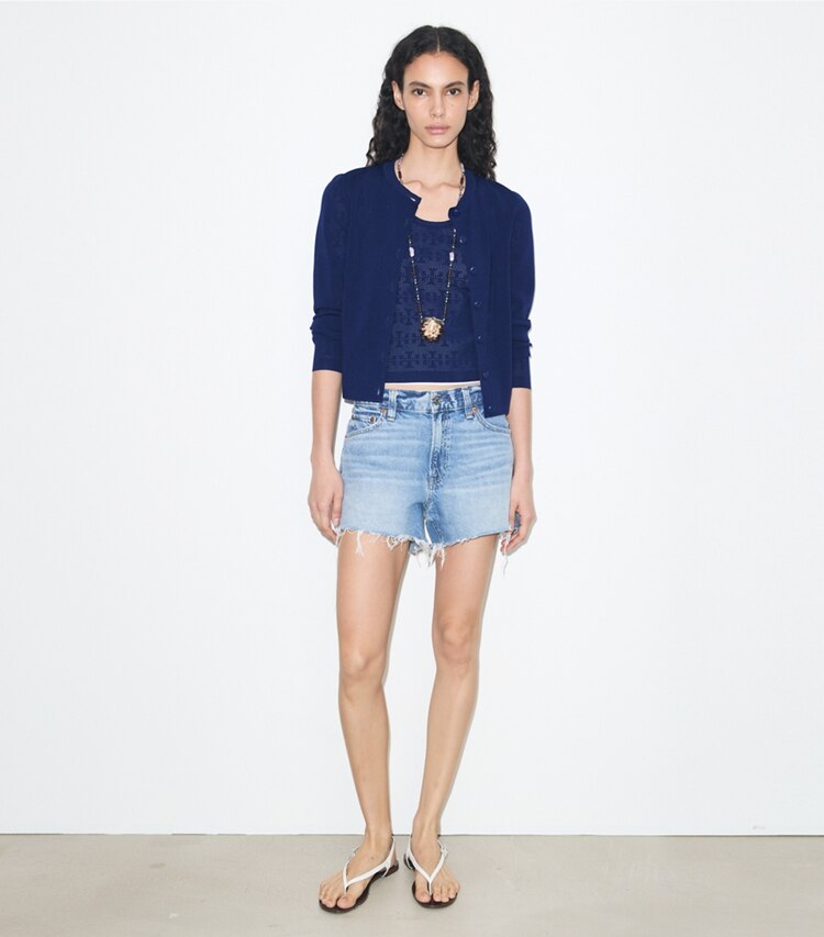 Tory Burch designer sweaters Cardigan en viscose à point pointelle dans Ocean sur modèle, de face