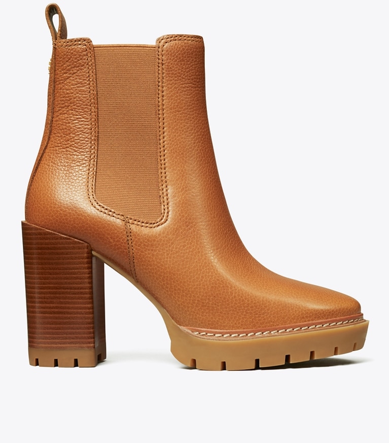 Tory Burch designer ankle boots Carson Lug Sole Ankle Boot in Toasted Caramel angle