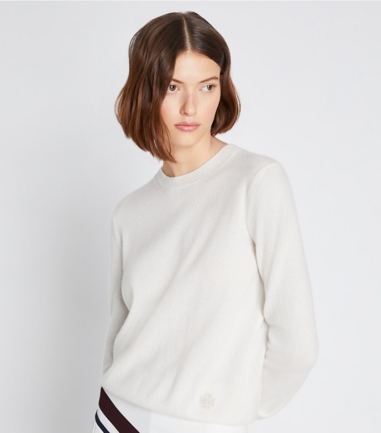 Tory Sport designer sweaters Cashmere Shrunken Crewneck in New Ivory Melange on model detail