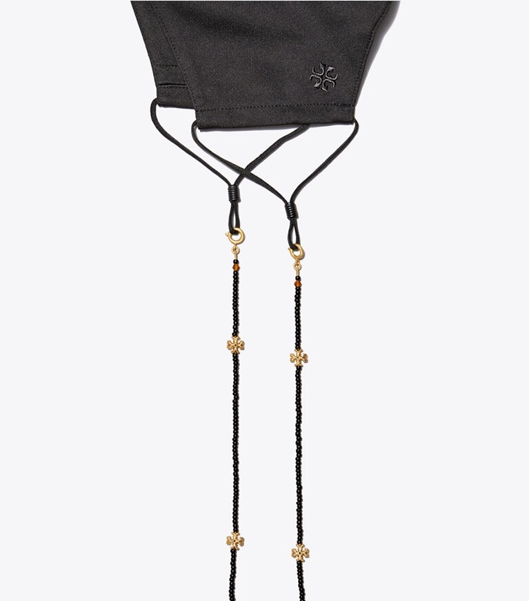 Tory Burch designer collane Catena per mascherina con perline in Rolled Brass / Black front