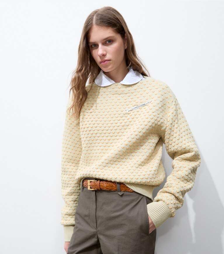 Tory Burch designer sweaters Chandail en laine brodé de raphia dans Pale Almond / Raffia détail sur modèle