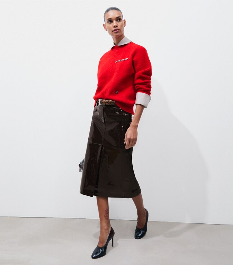 Tory Burch designer sweaters Chandail en laine dans Flame Red sur modèle, de face