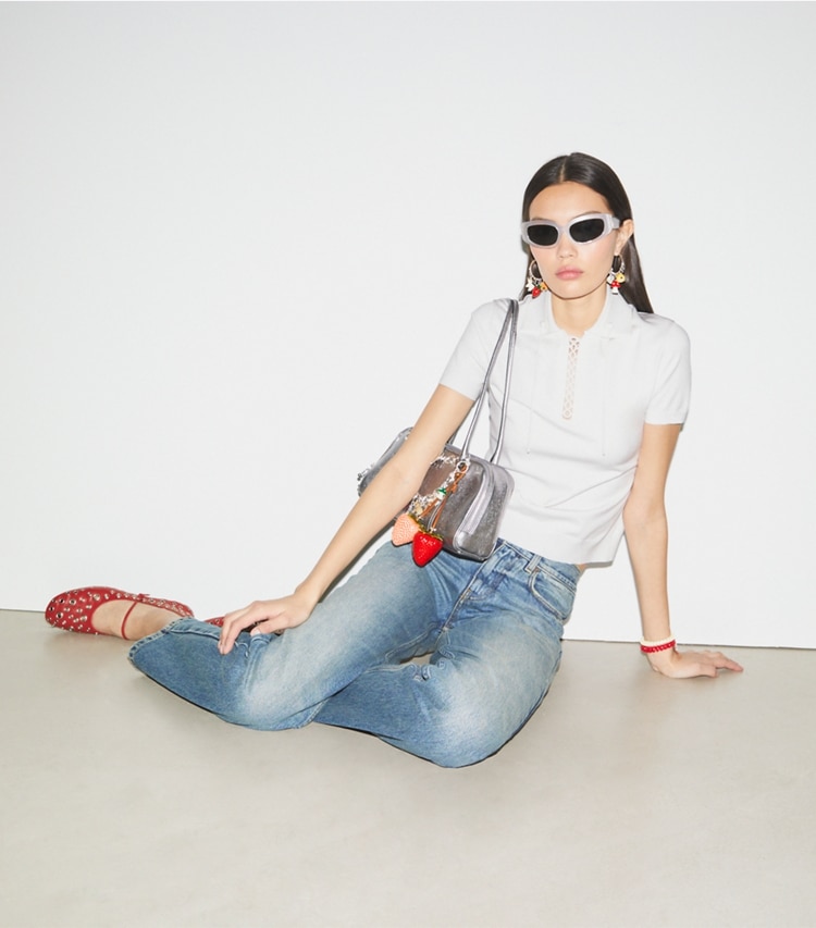 Tory Burch designer sweaters Chandail polo à lacets dans White studio