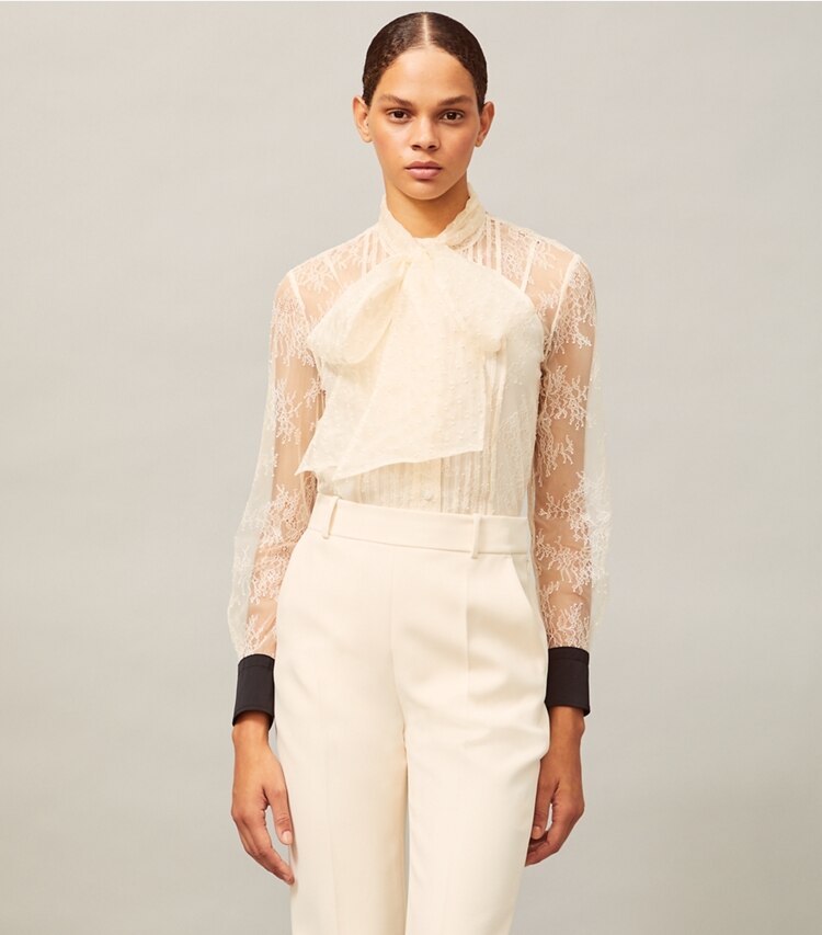 Tory Burch designer tops Chantilly Lace Bow Blouse in New Ivory on model detail