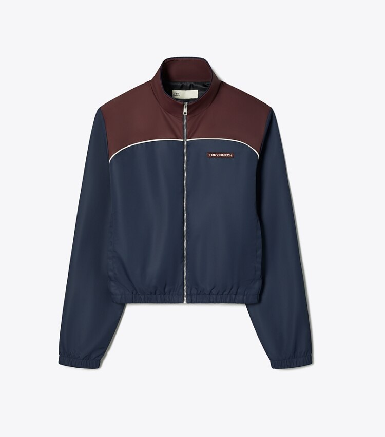 Tory Burch diseñador chaquetas Chaqueta de nailon con bloques de color en Medium Navy / Winetasting frente