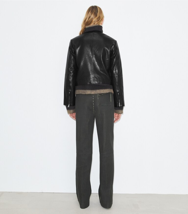 Tory Burch diseñador chaquetas Chaqueta de piel Handbag en Black parte posterior en modelo