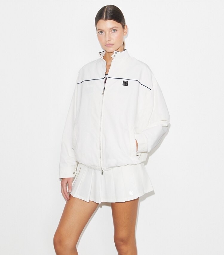 Tory Burch diseñador chaquetas Chaqueta de tenis de nailon extragrande en Snow White detalle en modelo
