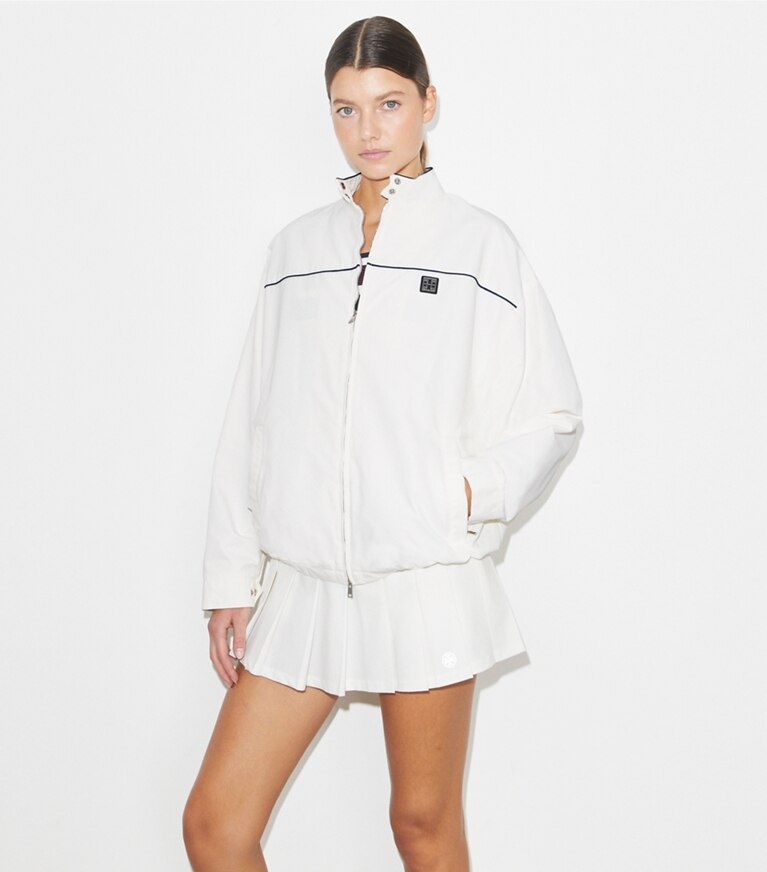 Tory Burch diseñador chaquetas Chaqueta de tenis de nailon extragrande en Snow White detalle en modelo