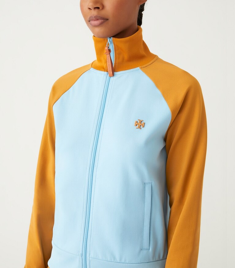 Tory Sport diseñador chaquetas Chaqueta deportiva de punto doble con bloque de color en Pastel Blue / Ridge detalle en modelo