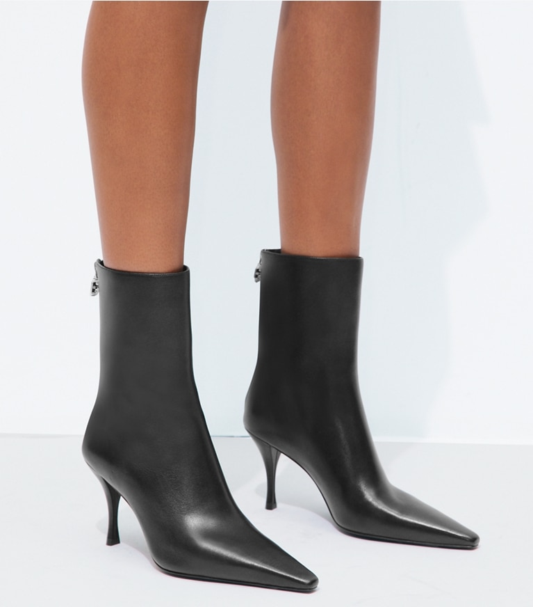 Tory Burch designer ankle boots Charlie Heeled Ankle Boot in PERFECT BLACK accessory on model