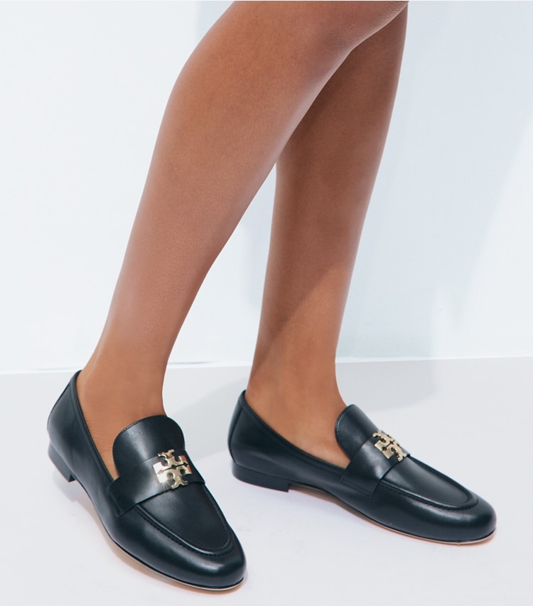 Tory Burch designer flats Charlie Loafer in PERFECT BLACK / GOLD accessory on model