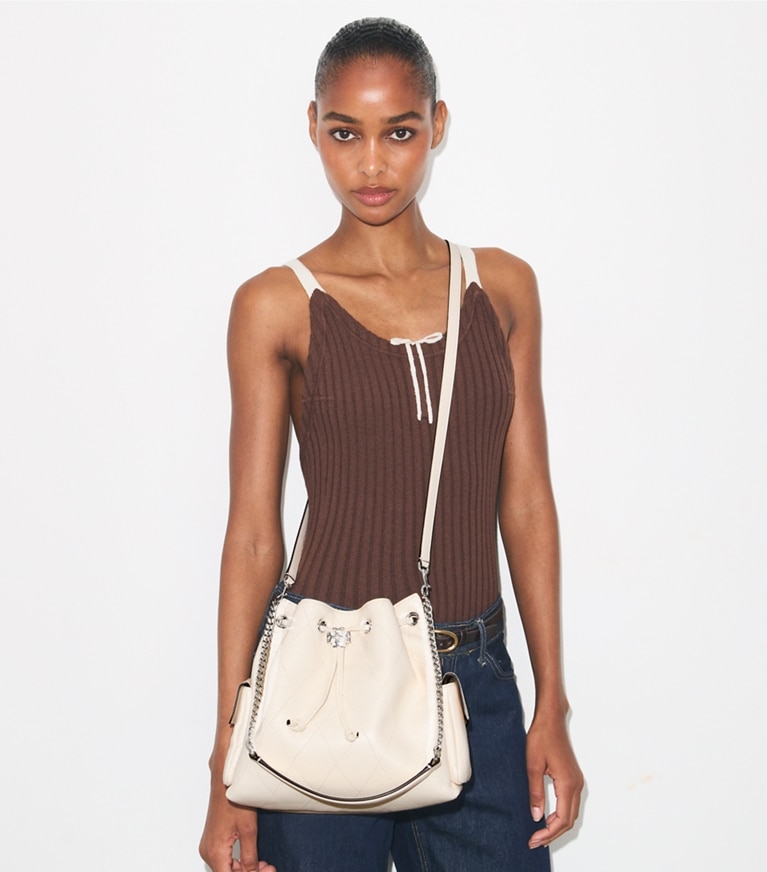 Tory Burch designer shoulder bags Charlie Quilted Drawstring Shoulder Bag in Light Cream additional on model