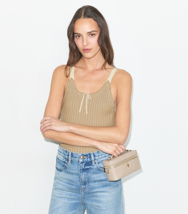 Tory Burch designer crossbody bags Charlie Quilted Vanity Case in Soft Cement additional on model